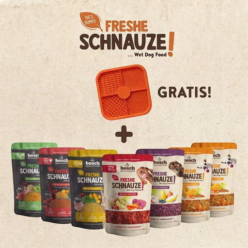 muunchy.de 8er Set Freshe Schnauze Nassfutter Toppings für Hunde mit einer orangefarbenen Silikon-Schleckmatte